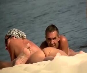 Spycam at naturist beach films bare studs and doll
