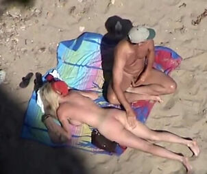 Candid beach lovemaking and naturist vid shot over the some